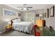 Bedroom featuring one large window, a ceiling fan, and two side tables at 357 Murray Hill Ne Ave, Atlanta, GA 30317