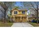 Charming two-story home featuring a double garage, front yard, and inviting curb appeal at 357 Murray Hill Ne Ave, Atlanta, GA 30317