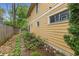 Charming home exterior featuring a landscaped pathway, mature trees, and beautiful natural light at 357 Murray Hill Ne Ave, Atlanta, GA 30317