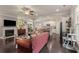 Bright and airy living room with a fireplace, hardwood floors, and an open floor plan at 357 Murray Hill Ne Ave, Atlanta, GA 30317