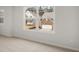 Bedroom featuring a large window with views of the neighborhood at 7181 Linden Dr, South Fulton, GA 30349