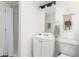 Bathroom featuring updated vanity, mirror, lighting, toilet, and shower at 2315 Shamrock Dr, Decatur, GA 30032