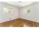 Inviting bedroom with gleaming hardwood floors and ample natural light at 2315 Shamrock Dr, Decatur, GA 30032
