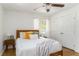 Cozy bedroom with natural light, hardwood floors, ceiling fan, and closet at 2315 Shamrock Dr, Decatur, GA 30032