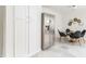 Dining area with stainless refrigerator, lovely tile floors, and a stylish table at 2315 Shamrock Dr, Decatur, GA 30032