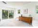 Bright living room featuring a sliding glass door, natural lighting, and modern furniture at 2315 Shamrock Dr, Decatur, GA 30032
