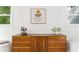 Tastefully decorated room features a modern dresser with wine and flowers at 2315 Shamrock Dr, Decatur, GA 30032