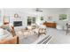 Inviting living room with a fireplace, neutral furniture, and lots of natural light at 2315 Shamrock Dr, Decatur, GA 30032