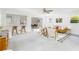 Open concept living area with breakfast bar, dining area, and comfortable seating at 2315 Shamrock Dr, Decatur, GA 30032