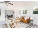 Spacious living room connects to the dining area with modern furniture and decor at 2315 Shamrock Dr, Decatur, GA 30032