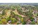 Aerial view showing the property location within a neighborhood and golf course community at 3997 Ironhill Ln, Woodstock, GA 30189