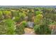 Picturesque aerial view of a home nestled among lush green trees in a quiet neighborhood at 3997 Ironhill Ln, Woodstock, GA 30189