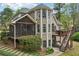 Expansive backyard with screened porch, deck, and stone pathways. Perfect for outdoor living at 3997 Ironhill Ln, Woodstock, GA 30189