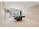 Basement featuring a pool table with bay window at 3997 Ironhill Ln, Woodstock, GA 30189