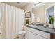 Bathroom featuring a shower curtain and vanity at 3997 Ironhill Ln, Woodstock, GA 30189