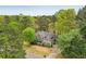Charming two-story home featuring a well-manicured lawn and inviting front porch at 3997 Ironhill Ln, Woodstock, GA 30189