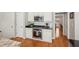 Beautiful kitchen includes stainless steel appliances, granite counters, and tiled backsplash at 3997 Ironhill Ln, Woodstock, GA 30189