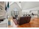 Inviting living area featuring vaulted ceilings, fireplace, and open floor plan at 3997 Ironhill Ln, Woodstock, GA 30189