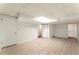 Spacious basement area featuring multiple closets and wood-look flooring at 5666 Bob White Nw Cir, Lilburn, GA 30047