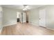 Spacious bedroom with two closets and convenient access to an en-suite bathroom at 5666 Bob White Nw Cir, Lilburn, GA 30047