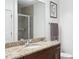 Bathroom vanity with granite countertops and a shower at 855 Peachtree Ne St # 3005, Atlanta, GA 30308