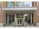 Modern building entrance features sleek design and well-maintained landscaping at Viewpoint Condominiums at 855 Peachtree Ne St # 3005, Atlanta, GA 30308