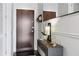 Stylish entryway with console table, accent mirror, and elegant decor provides a welcoming ambiance at 855 Peachtree Ne St # 3005, Atlanta, GA 30308