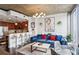 Bright living room features comfortable seating, modern decor, and seamless flow to the kitchen area at 855 Peachtree Ne St # 3005, Atlanta, GA 30308