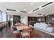 Common area featuring a kitchen, lounging area, and tables at 855 Peachtree Ne St # 3005, Atlanta, GA 30308