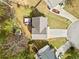Bird's eye view of home, highlighting the backyard deck and landscaping in a serene, tree-lined setting at 3638 Clubside Nw Walk, Kennesaw, GA 30144