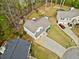 Overhead shot of home displaying a backyard deck, a lush lawn, and the surrounding neighborhood at 3638 Clubside Nw Walk, Kennesaw, GA 30144