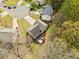 Aerial perspective of home with backyard deck nestled within a verdant, tree-filled lot in a quiet neighborhood at 3638 Clubside Nw Walk, Kennesaw, GA 30144
