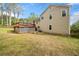 Home featuring a wooden back deck, providing a perfect space for outdoor relaxation and entertainment at 3638 Clubside Nw Walk, Kennesaw, GA 30144
