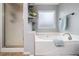 Relaxing bathroom features a bathtub and a separate shower cabin, designed for both quick refreshes and relaxation at 3638 Clubside Nw Walk, Kennesaw, GA 30144