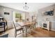 Bright dining room with wood floors, natural light, and charming decorative touches at 3638 Clubside Nw Walk, Kennesaw, GA 30144