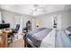 Comfortable main bedroom with a view, desk space, and generous closet, ideal for relaxation and productivity at 3638 Clubside Nw Walk, Kennesaw, GA 30144