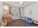 Bright bedroom featuring a playful interior design with room to sleep and play at 5890 Vinyard Ln, Cumming, GA 30041