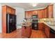 Well-equipped kitchen with granite countertops and stainless steel appliances at 5890 Vinyard Ln, Cumming, GA 30041