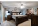 Bedroom with ample natural light, ceiling fan, and coastal-themed decor at 603 Bluff Dr, Woodstock, GA 30188