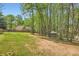 Expansive backyard with mature trees and a charming gazebo offers a private retreat at 270 Albertas Ct, Mcdonough, GA 30252