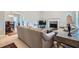 Cozy living room showcasing a fireplace, a TV, and comfortable seating arrangement at 270 Albertas Ct, Mcdonough, GA 30252