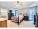 A main bedroom features ample space, carpeted floors, and decorative trey ceiling at 270 Albertas Ct, Mcdonough, GA 30252