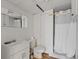 Bathroom with shower, sink, and toilet. Medicine cabinet is on the wall at 3501 Wesley Chapel Rd, Decatur, GA 30034