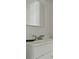 Close up of bathroom vanity showcasing stainless steel faucet and white countertop at 3501 Wesley Chapel Rd, Decatur, GA 30034