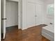 Bedroom featuring closet and wood floors at 3501 Wesley Chapel Rd, Decatur, GA 30034