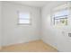 Small room featuring two windows and linoleum flooring at 3501 Wesley Chapel Rd, Decatur, GA 30034