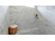 Luxurious marble shower featuring a built-in bench and corner shelf, complemented by soft towels at 4220 Provenance Trl, Cumming, GA 30028