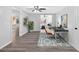 Finished basement area featuring a home office, neutral color palette, and luxury vinyl flooring at 46 Centerport Dr, White, GA 30184