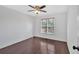 Bedroom with hardwood floors and a window with natural light at 46 Centerport Dr, White, GA 30184