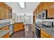 Modern kitchen features granite countertops, stainless steel appliances, and ample cabinet space at 46 Centerport Dr, White, GA 30184